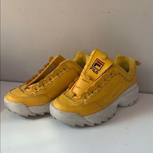Yellow Fila Disruptors